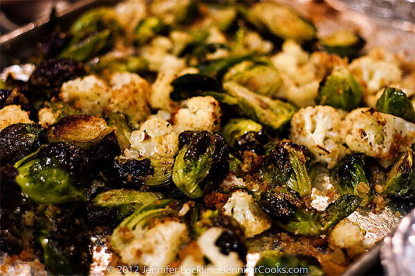 Turmeric Roasted Cauliflower & Brussels Sprouts with Avocado Cilantro Dip